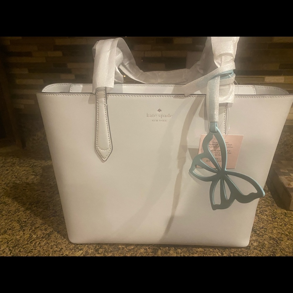 Light grey with teal accents Kate spade purse